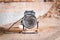 Industrial heat gun at a construction site close-up. Industrial electric heater for heating and drying building premises