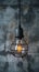 Industrial innovation hanging lightbulb on textured cement backdrop