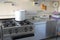 Industrial kitchen with gas stove and the giant aluminum pot
