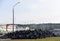 Industrial landfill for the processing of waste tires and rubber tyres. Pile of old tires and wheels for rubber recycling