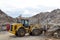 Industrial landfill for the processing of waste tires and rubber tyres. Pile of old tires and wheels for rubber recycling. Tyre