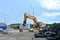 Industrial landfill for recycling used rubber tires and old concrete structures.