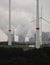 Industrial landscape with a line of majestic wind turbines