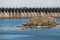 Industrial landscape. Powerful concrete dam blocks river