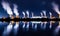 Industrial landscape with smoking chimneys and reflection in water at night