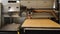 Industrial laser cutter working on plywood sheet - timelapse