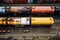 Industrial logistics Top view of various railway wagons and tanks