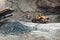 Industrial machinery on ore quarry site