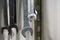 Industrial macro shot of metal wrenches hanging on wall