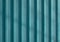 Industrial metallic fence. Iron blue corrugated profile