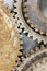 industrial old corroded gears for machinery on scratched background