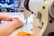 Industrial overlock sewing machine in work