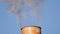 Industrial Pipe Smokes Blue Sky Background