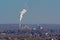 Industrial plant with smoking chimney near Mons