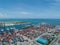 Industrial port with containers, Large container vessel unloaded in Port. Cargo Ship Loading. Ocean Transportation Theme.