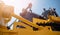 Industrial portrait of working man, excavator driver climbs into cab to perform work on construction site