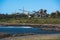 Industrial refinery or construction material yard by the ocean