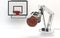Industrial robot on a white background. Robotic hand holds a ball on the background of a basketball backboard. Conceptual creative