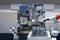 Industrial robotic working with metal part and CNC Machine on smart factory