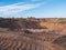 Industrial sand quarry or pit landscape. Construction industry. Sand hills background