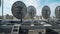 Industrial satellite dishes on the roof of a building