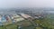 Industrial shops on the river bank, China. Plant on the river bank