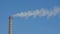 Industrial smoking chimney on blue sky