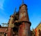 Industrial steel stacks rusted and colorful over time in Bethlehem Pa on a summer day.