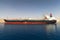 Industrial tanker ship loading in a port