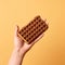 Industrial Textured Chocolate Waffle On Yellow Background