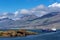 Industrial vessel moving to the Djupivogur town through Berufjordur Fjord in Eastern Iceland