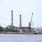 Industrial view of docks and multiple cranes on sea port