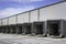 Industrial warehouse loading docks. Warehouse doors. Open gates