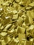industrial waste fine metal flakes.  crushed yellow strips of zinc