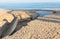 Industrial wastewater, the pipeline discharges liquid industrial waste into the sea on a city beach. Dirty sewage flows from a