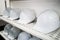 Industrial white safety helmet storage in factory