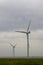Industrial wind turbines are on the plain