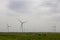 Industrial wind turbines are on the plain