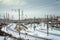 Industrial winter cityscape with railroads