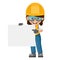 Industrial woman worker with his personal protection equipment holding a sign with space for text. Industrial safety and