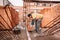 Industrial worker, bricklayer and mason working with bricks