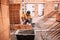 Industrial worker, bricklayer and mason working with bricks