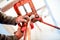 Industrial worker using industrial copper cutter in plumbing