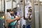 Industrial worker welding in metal factory.