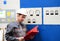 industrial workers inspect the technology of a plant for function - assembler in working clothes