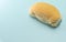 Industrialized French bread on blue background