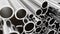 Industry business production and heavy metallurgical industrial products, many shiny steel pipes, industrial background