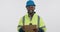 Industry, clipboard and face of construction worker in a studio for inventory or maintenance. Happy, checklist and