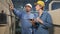 Industry engineer teams inspect machine control panels in manufacturing factory.