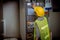 Industry engineer and worker wearing safety uniform under control sliding metal plate machine in factory production line with fact